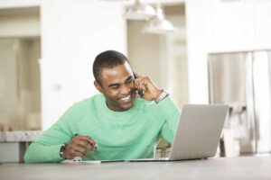 man at home applying for a Debt Relief Order